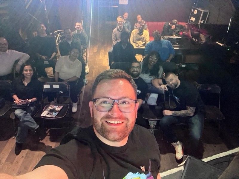 Josh speaking at an event